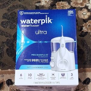 Waterpik Ultra Water Flosser with 10 Settings, 6 Tips, ADA Accepted, White